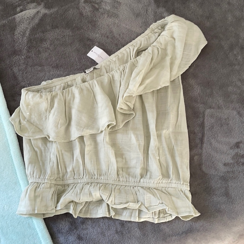 White green one shoulder top